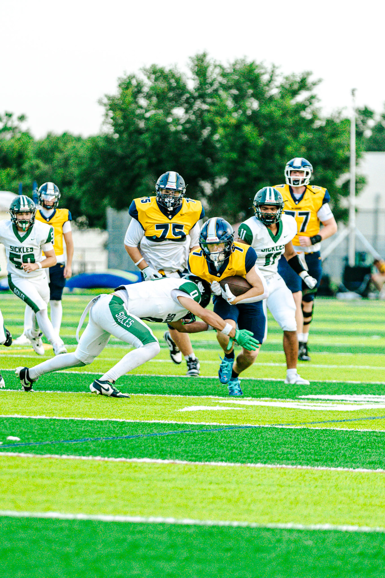 Warriors runner charging through defenders